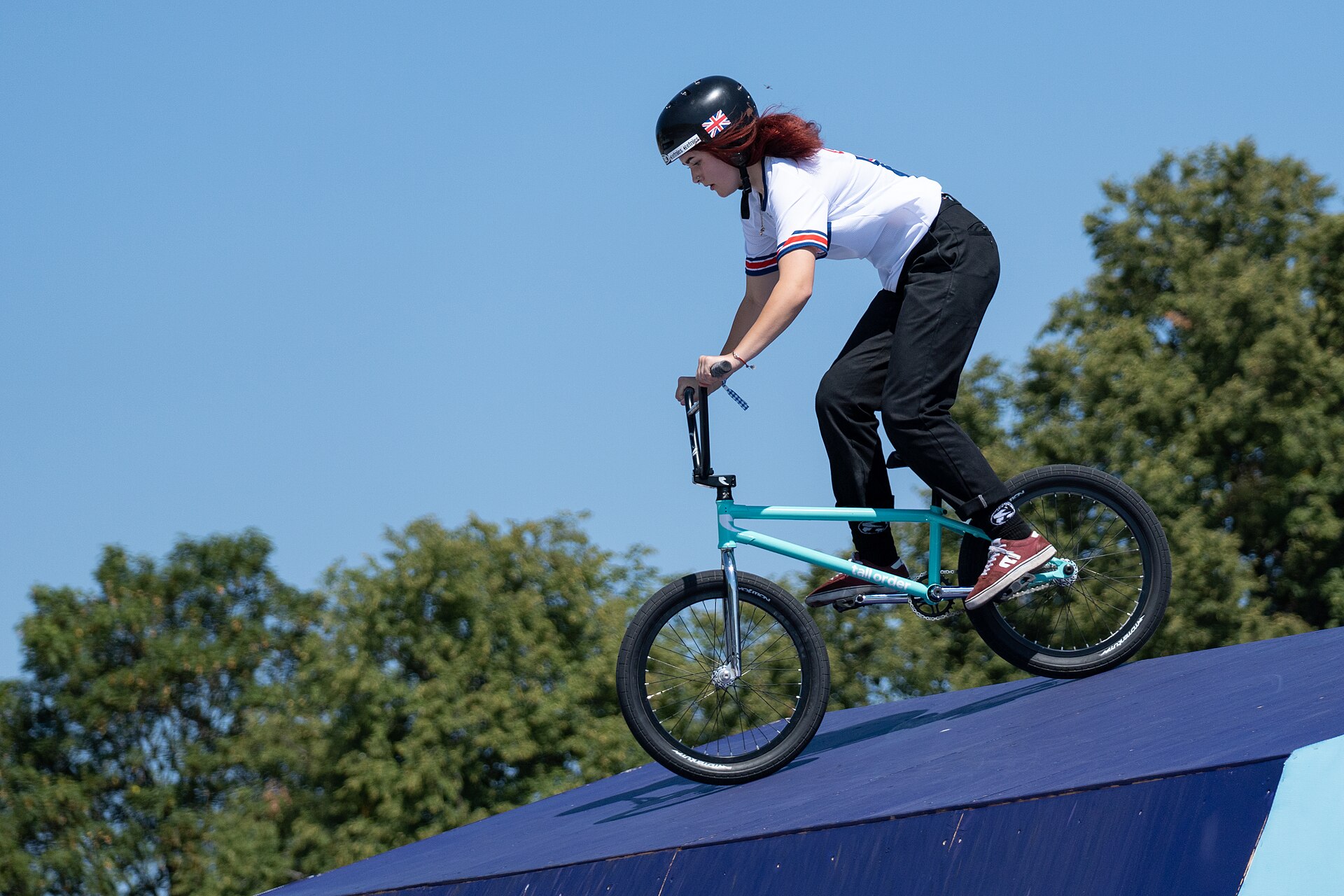 A rider in the air during the women's BMX freestyle park qualifications at the 2022 European Championships in Munich