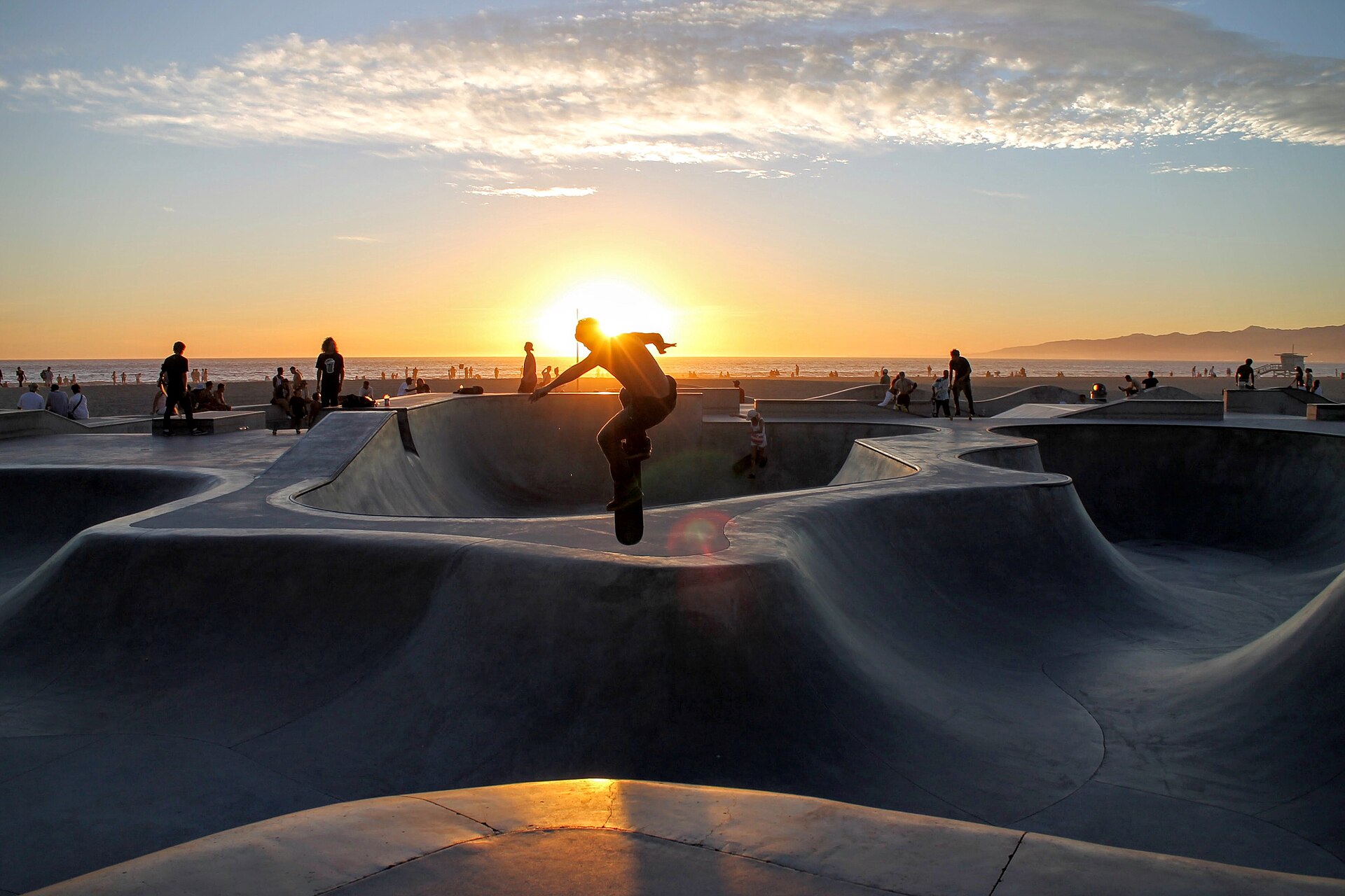 Modern concrete bowls at Venice Beach Skatepark beside the boardwalk in Los Angeles, California